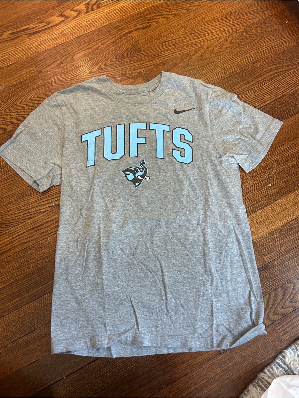 Nike Grey T-Shirt with Light Blue Tufts Logo